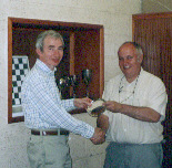 Roger Yates (left) receives the Fred Dollin Plate for his win in the All-Play-All from Club Secretary, Jim Keene